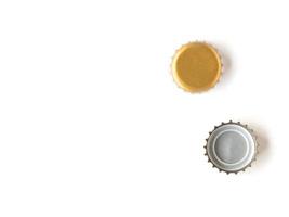 Bottle caps on a white background, Free space for text. photo