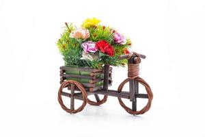 wooden tricycle toy on white background. photo