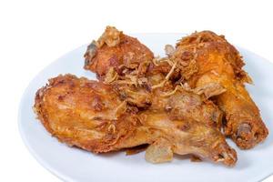 Fried Chicken Drumstick on white dish,isolated on white background,clipping path photo