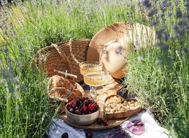 Summer picnic on a lavender field photo