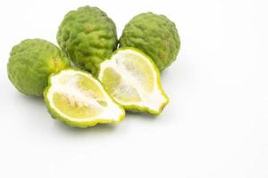 Bergamot or kaffir lime on white background. photo