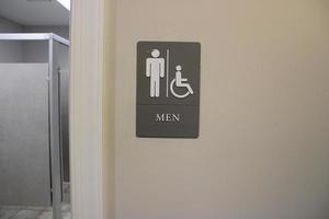 Men restroom sign interior stainless photo