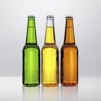 Beer bottle with water drops in room studio for advertising photo