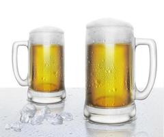 beer glass with water drops and ice cubes on white background photo