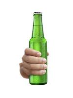 A man holding Beer bottle with water drops isolated on white background photo