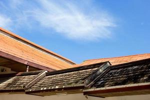 Brown roof tile with sky photo