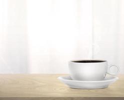 Cup of coffee on a wooden table photo