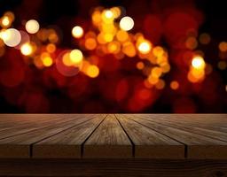 Wooden table top on shining bokeh background. concept for chossing best design photo