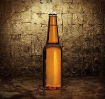 Close up of three beer bottles. Cold refreshment photo