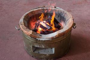 coal stove with flame photo