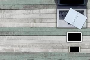 laptop and table workspace office on wooden table photo