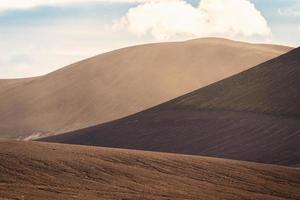 Brown mountain layers with sunlight in Icelandic highlands on Landmannalaugar photo