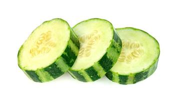 sliced Cucumber or Cucumis melo isolated on white background photo