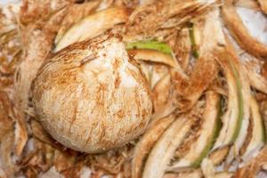 Brown Coconut Water Drink with coconut residue background photo