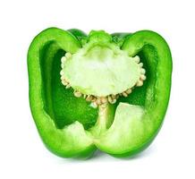 green slice sweet bell pepper isolated on white background photo