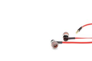 red earphone isolated on white background photo