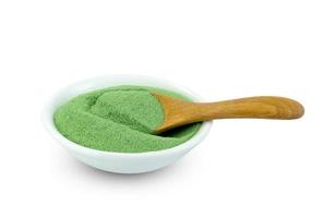 japan green tea flavor powder drink with bowl and Wooden spoon isolated on white background ,include clipping path photo