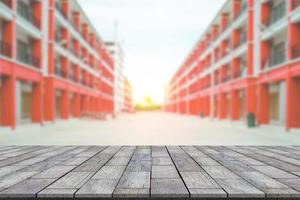 stone table with blur image of commercial buildings background photo