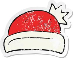 retro distressed sticker of a cartoon christmas hat vector