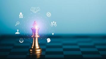 business success strategy ideas from teamwork, planning, brainstorming and creative problem solving methods, chess pieces and icons representing targeted growth development ideas. photo