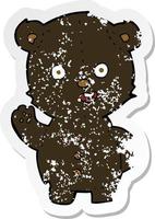 retro distressed sticker of a cute cartoon black bear vector