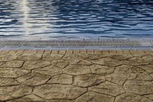 Edge of a swimming pool photo