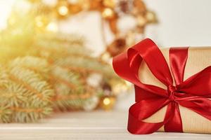 Christmas gift box with ribbon and christmas decorations
