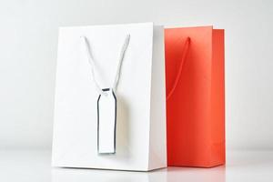 colorful paper shopping bag on a white background photo