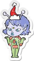 pretty distressed sticker cartoon of a alien girl wearing santa hat vector