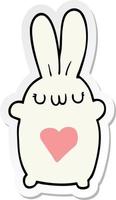 sticker of a cute cartoon rabbit with love heart vector