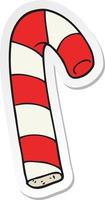 sticker of a cartoon candy cane vector