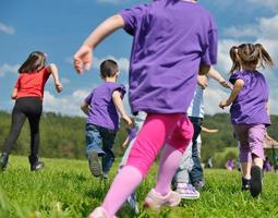 happy kids group  have fun in nature photo