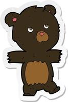 sticker of a cartoon cute black bear vector