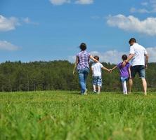 happy young family have fun outdoors photo