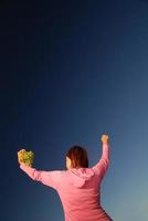 girl with grape outdoor photo