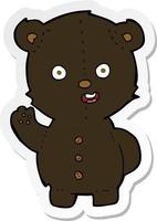 sticker of a cute cartoon black bear vector