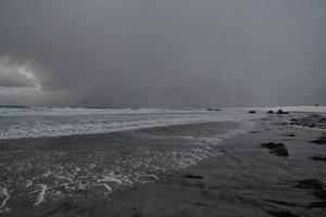 norway coast in winter with snow bad cloudy weather photo