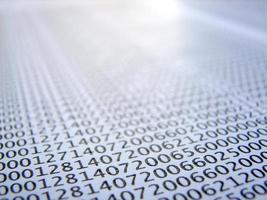 database concept with printed and coded database records photo
