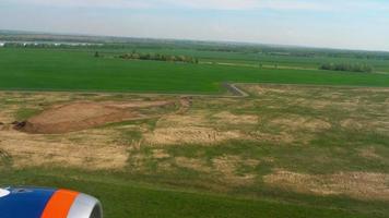 Aerial view from descending airplane video