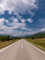 asphalt road in beautiful countryside photo