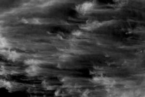 Textured cloud,Abstract black,isolated on black background photo