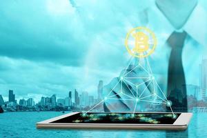Businessman plan digital money with bitcoin symbol and network connection concept,Elements of this image furnished by NASA photo