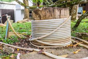 Old water hose on the timber photo