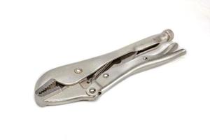Locking pliers isolated on a white background photo