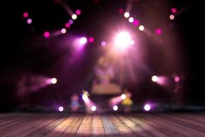 top wood desk with light bokeh in concert blur background,wooden table photo