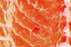 closeup texture of fresh salmon fillet sliced photo