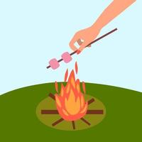 Hand is frying marshmallows over the fire. Picnic, rest, day off in nature. Cartoon vector illustration