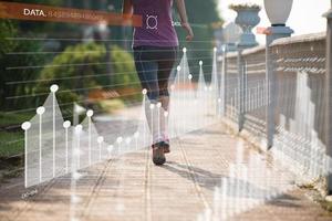 Fitness woman training and jogging in summer park photo