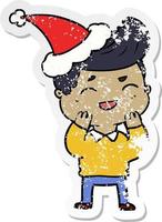 distressed sticker cartoon of a man laughing wearing santa hat vector