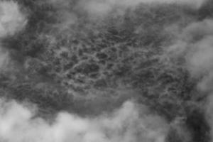 nube texturizada,blanco abstracto,aislado sobre fondo negro foto